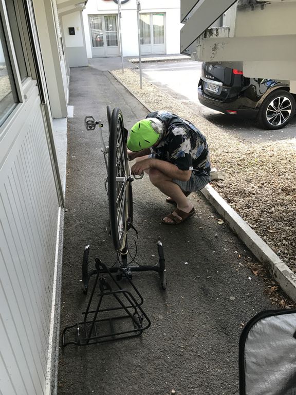 Steve works on assembling his bike